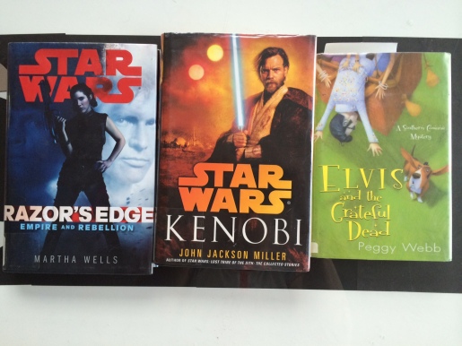 The books I picked up from the library: Star Wars Razor's Edge, Star Wars: Kenobi, and Elvis and the Grateful Dead